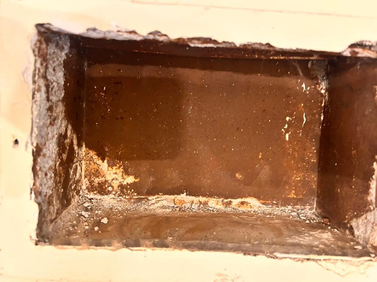 Rust and corrosion inside a wall vent boot